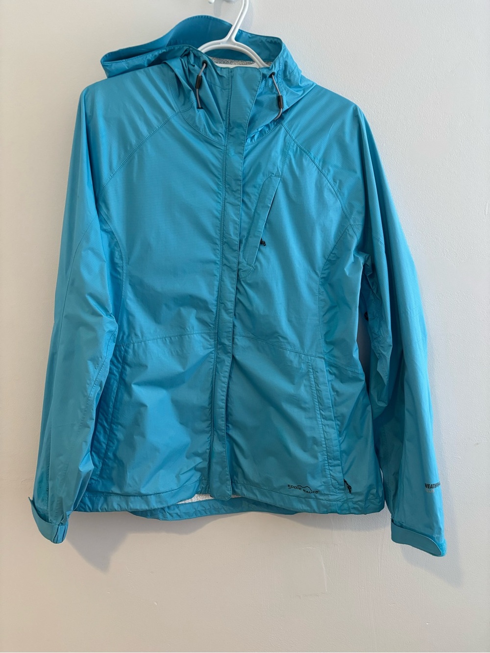 Eddie Bauer WeatherEdge Plus blue hooded rain jacket